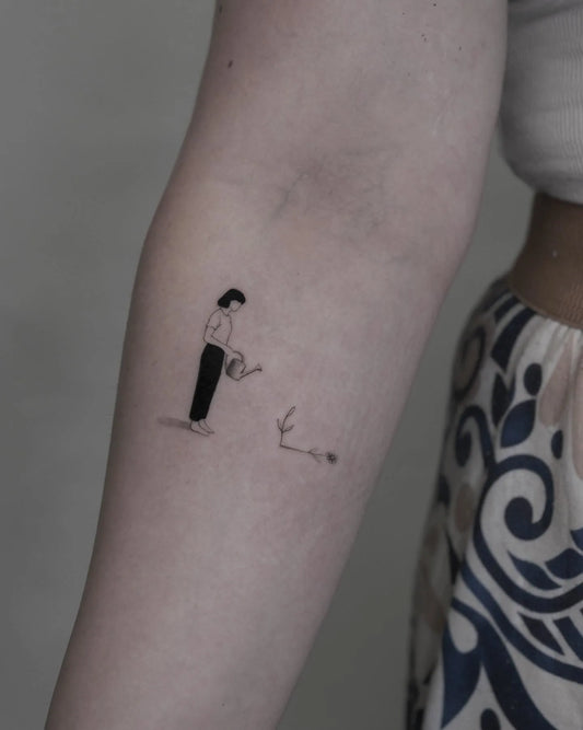 abstract illustrative minimalist woman planting tattoo on inner arm