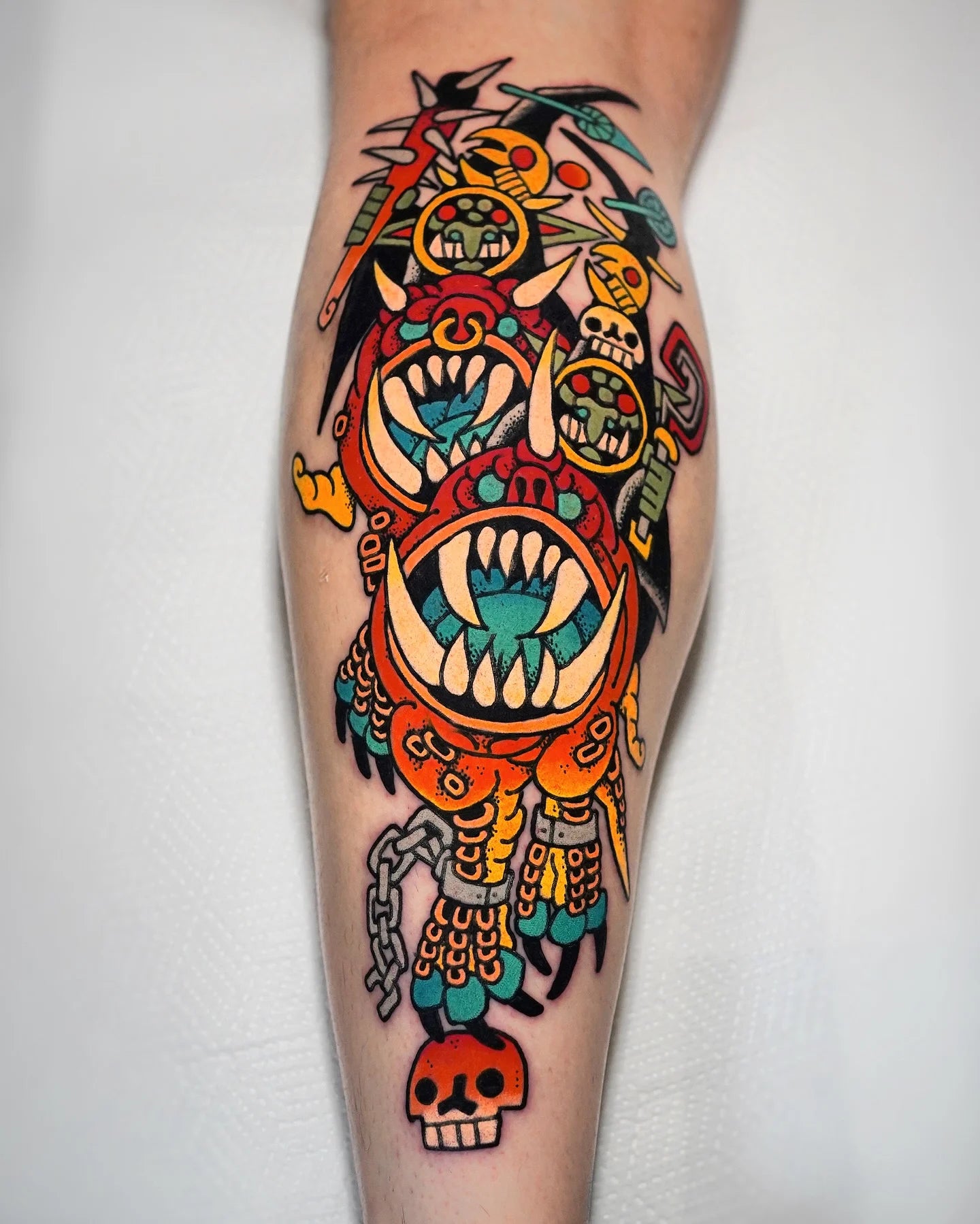 neo traditional colorful tribe tattoo on leg calf