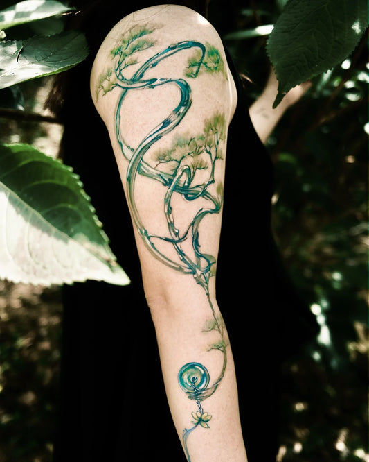 ivy vine arm tattoo