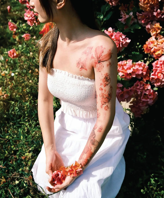 red flowers arm sleeve tattoo
