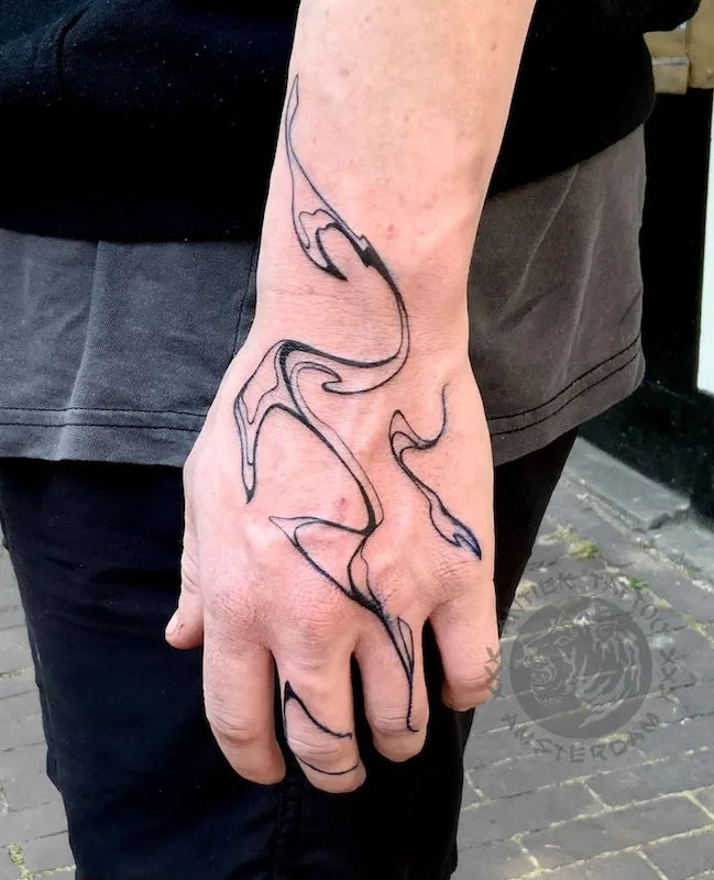 abstract blackwork lines tattoo on hand