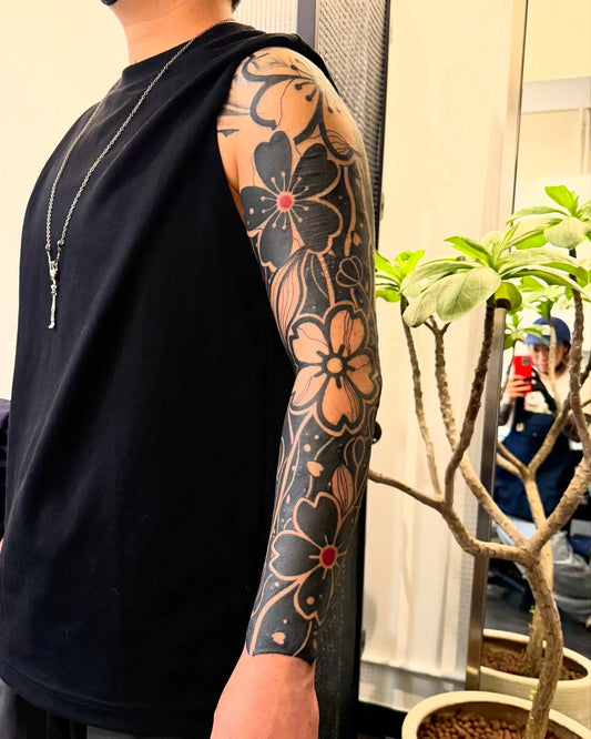 blackwork flower full sleeve tattoo