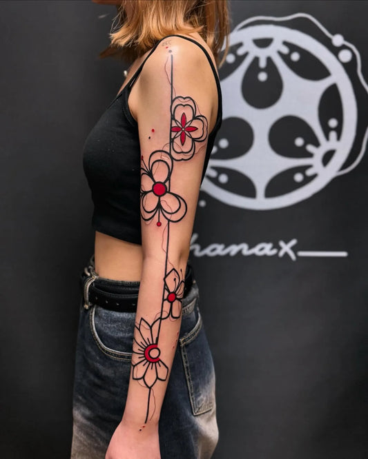 fine low flower sleeve tattoo