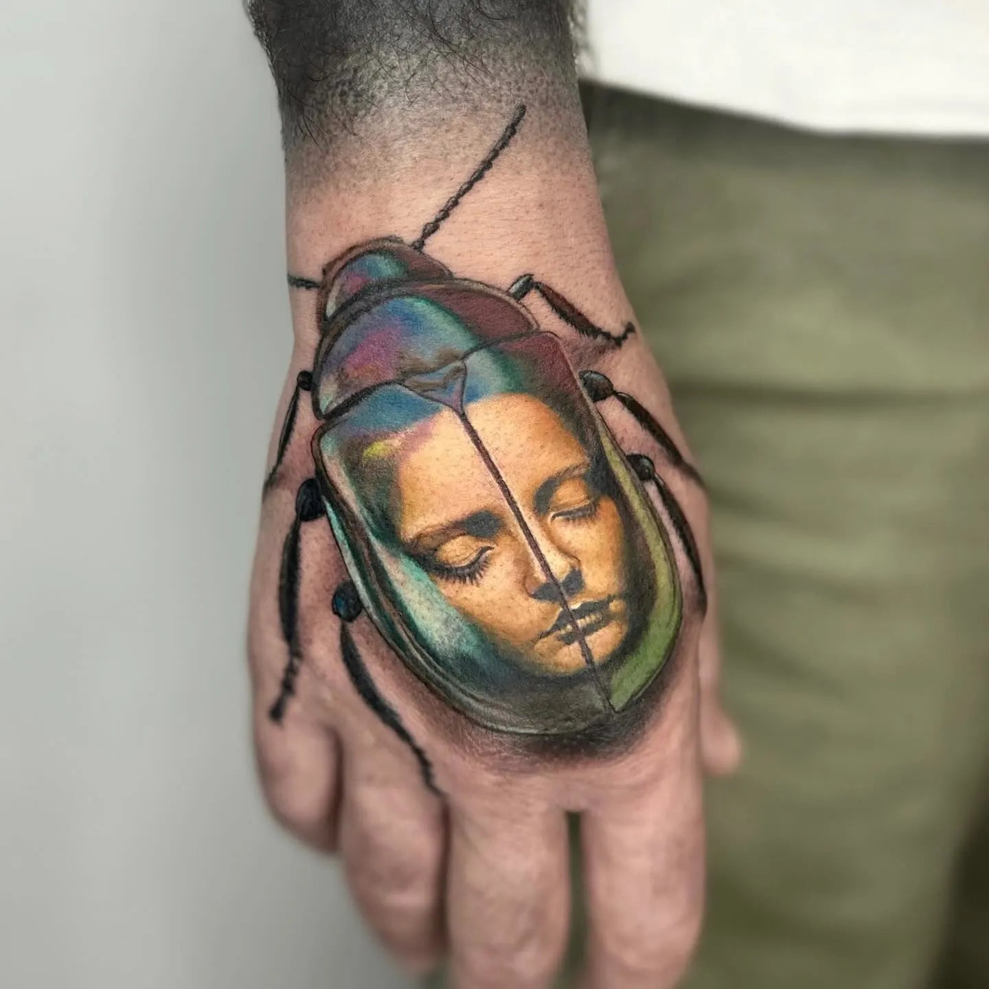realistic beetle girl face tattoo
