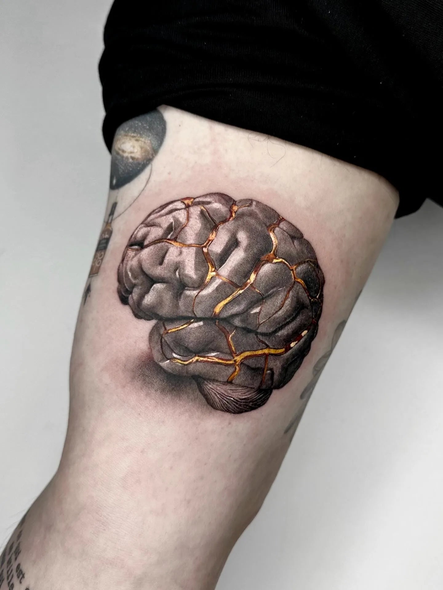 realism brain gold vein tattoo