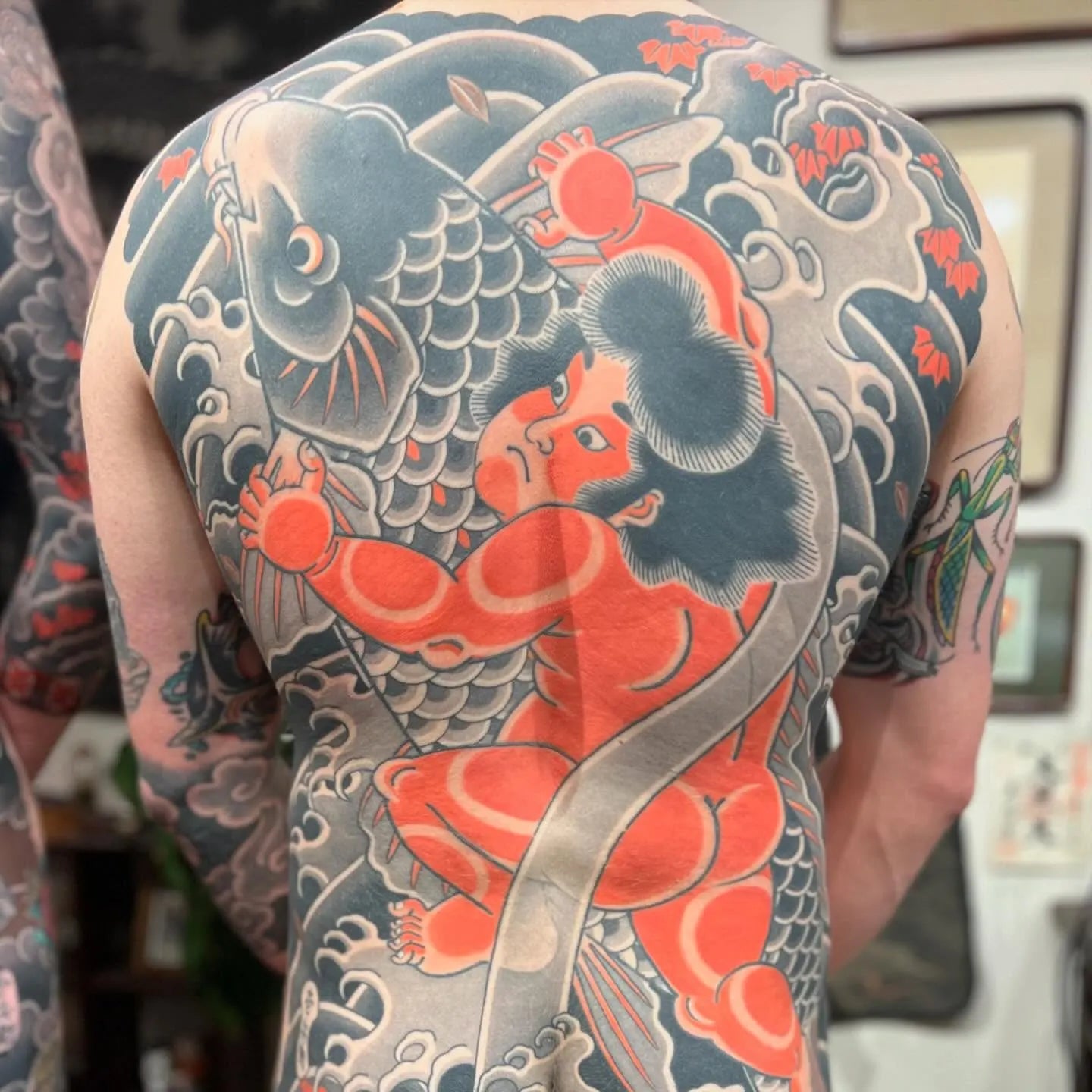 japanese orange kintaro and koi fish full back tattoo