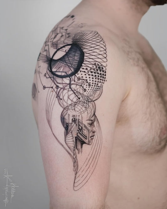 abstract geometric tattoo on man shoulder arm