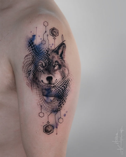 watercolor geometric abstract fox tattoo on man upper arm