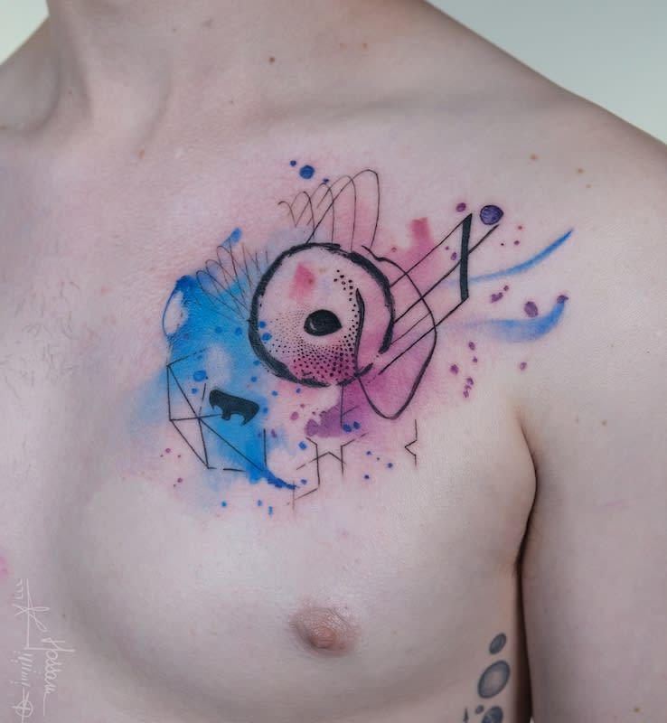 watercolor abstract tattoo on man chest