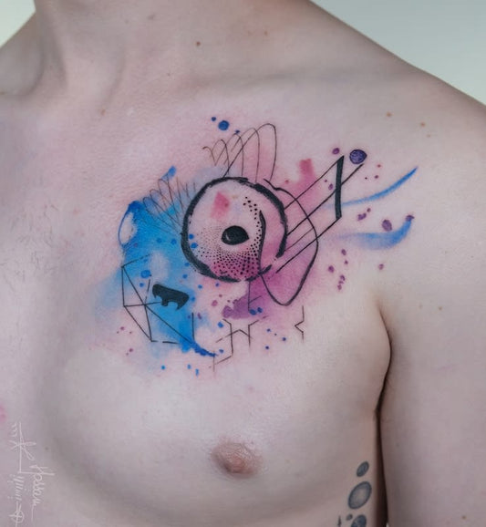 watercolor abstract tattoo on man chest