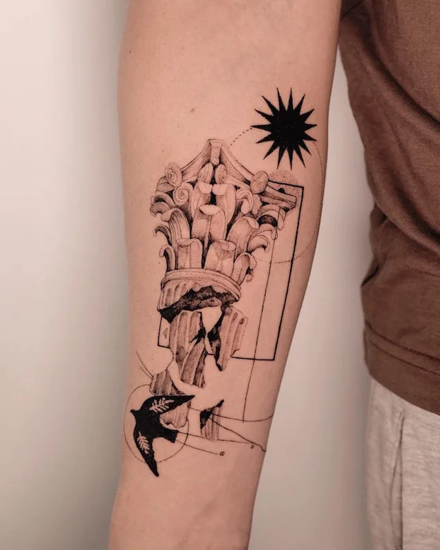 Corinthian greek architecture black and grey dotwork tattoo on forearm