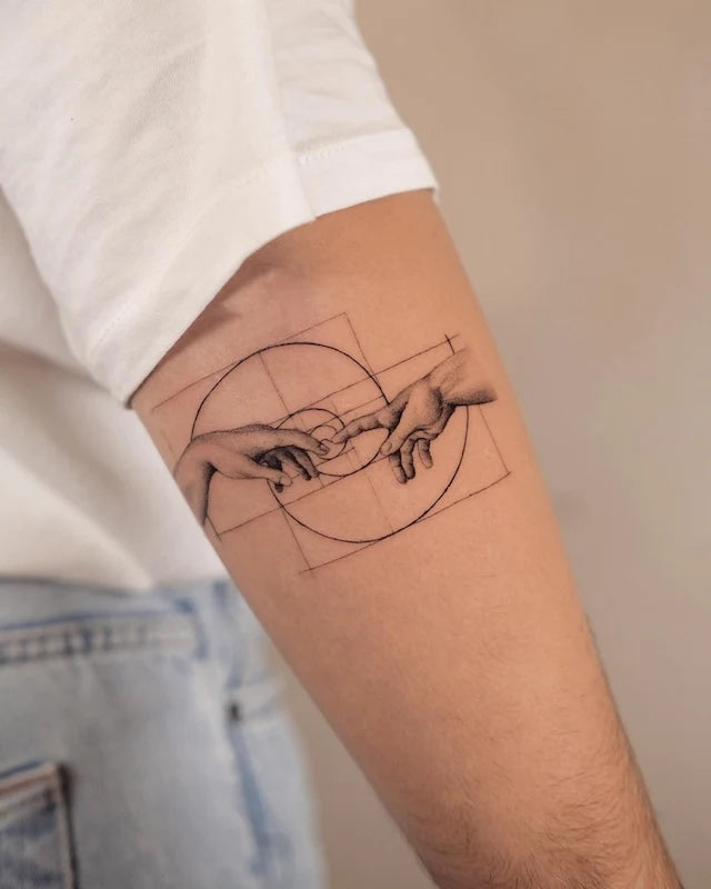 hand of god creation of adam Michelangelo Buonarroti black and grey geometric fibonacci tattoo on arm