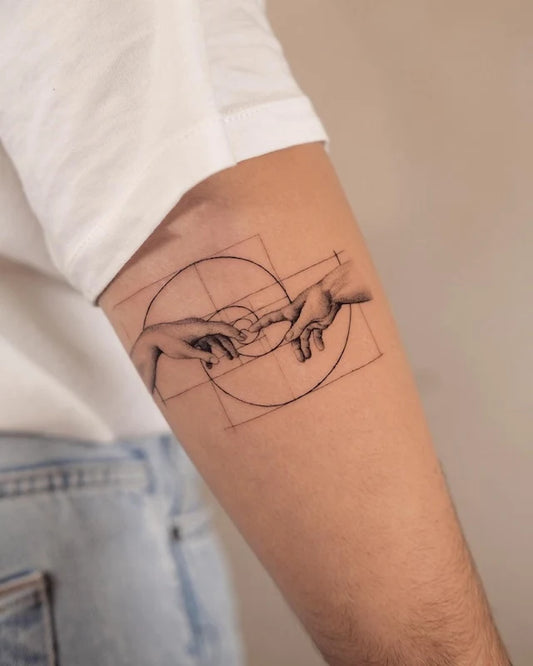 hand of god creation of adam Michelangelo Buonarroti black and grey geometric fibonacci tattoo on arm