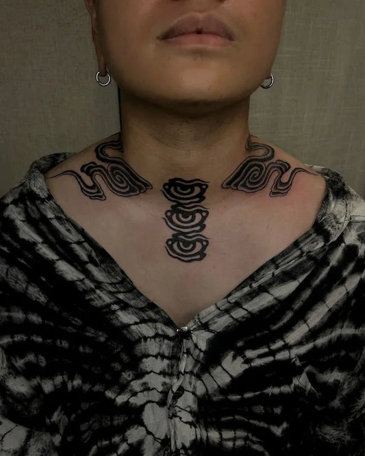 blackwork japanese cloud and eyes tattoo around neck