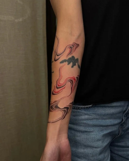 abstract color lines tattoo on forearm