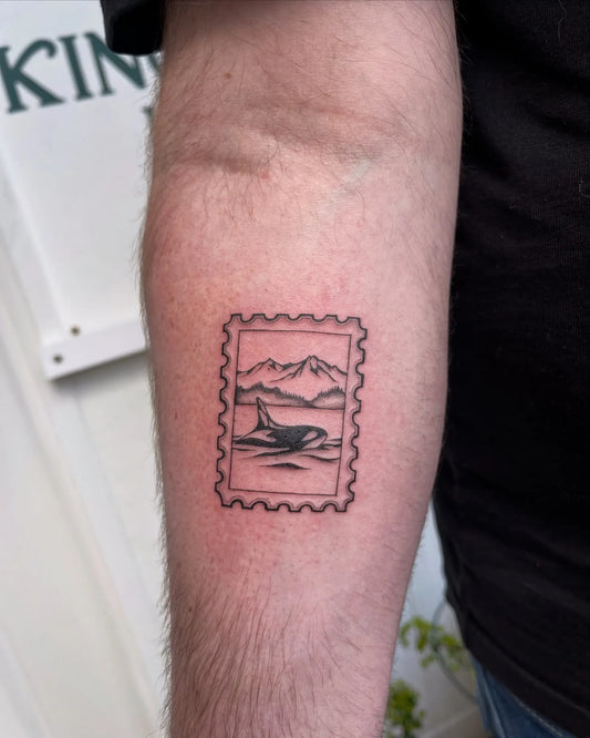 ocean postage stamp tattoo