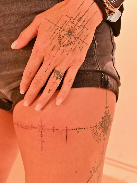 feminine ornamental hand tattoo 