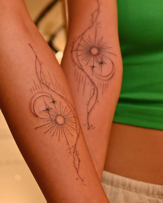 feminine matching celestial fine line ornamental tattoo 