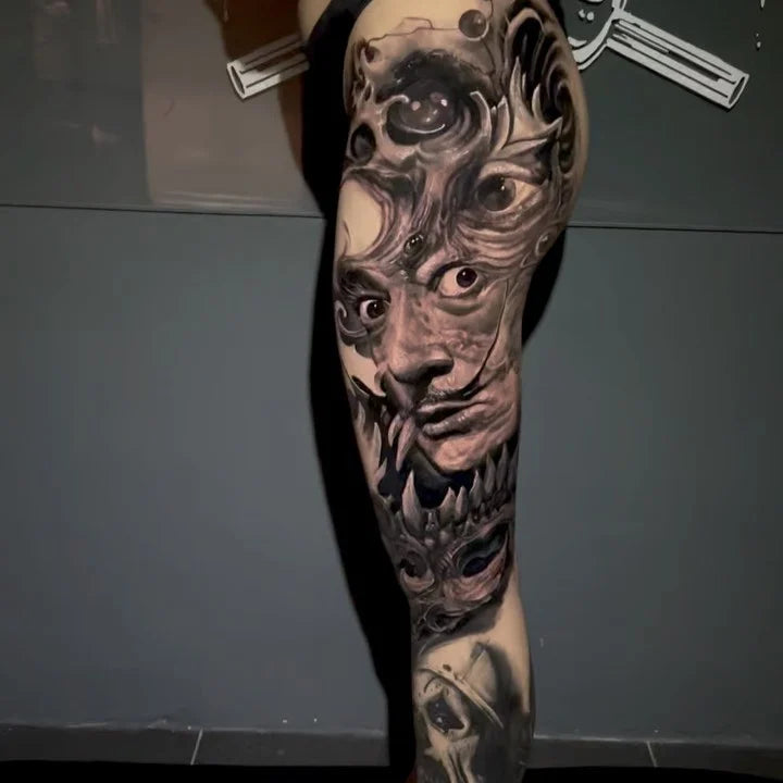 Salvador Dali black and grey realism full leg sleeve tattoo
