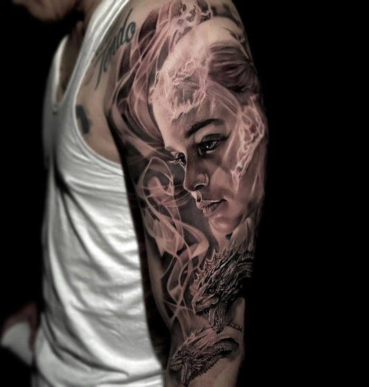 black and grey game of thrones realism full arm sleeve tattoo on man