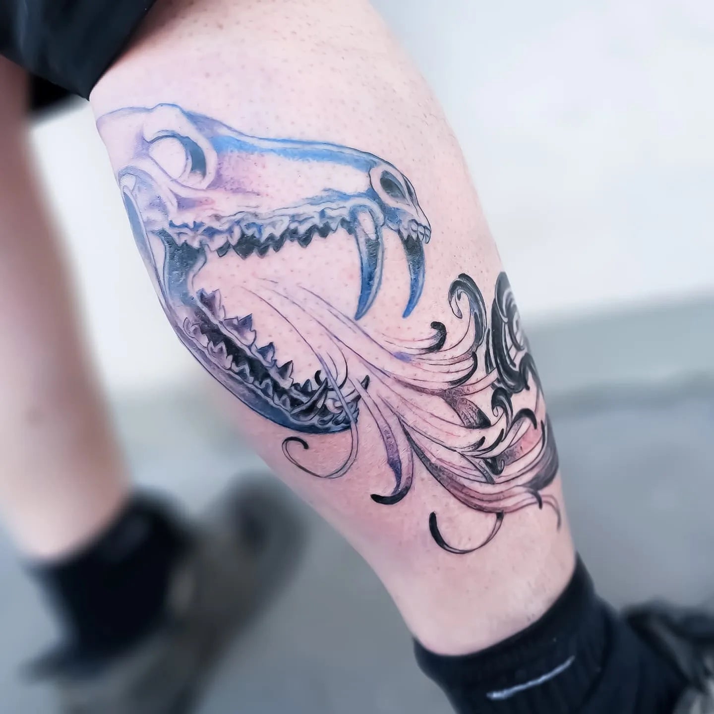 color dinosaur illustration calf tattoo