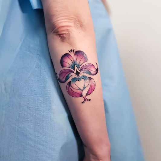 colorful pattern forearm tattoo
