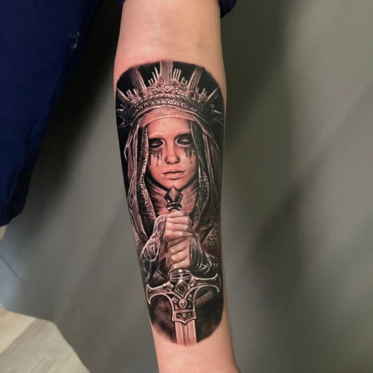 Lords of the Fallen realism tattoo on forearm