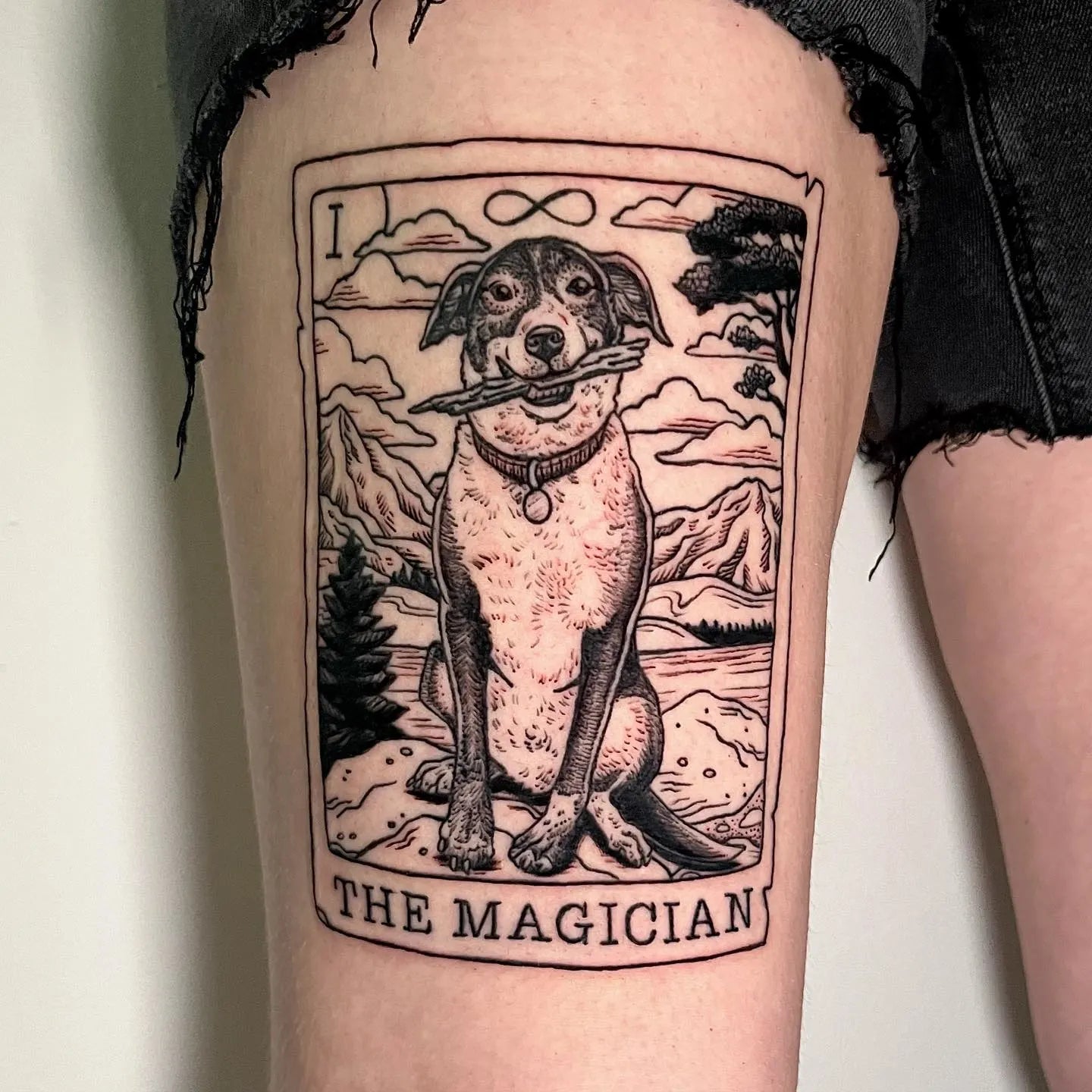 dog portrait the magician card thigh tattoo
