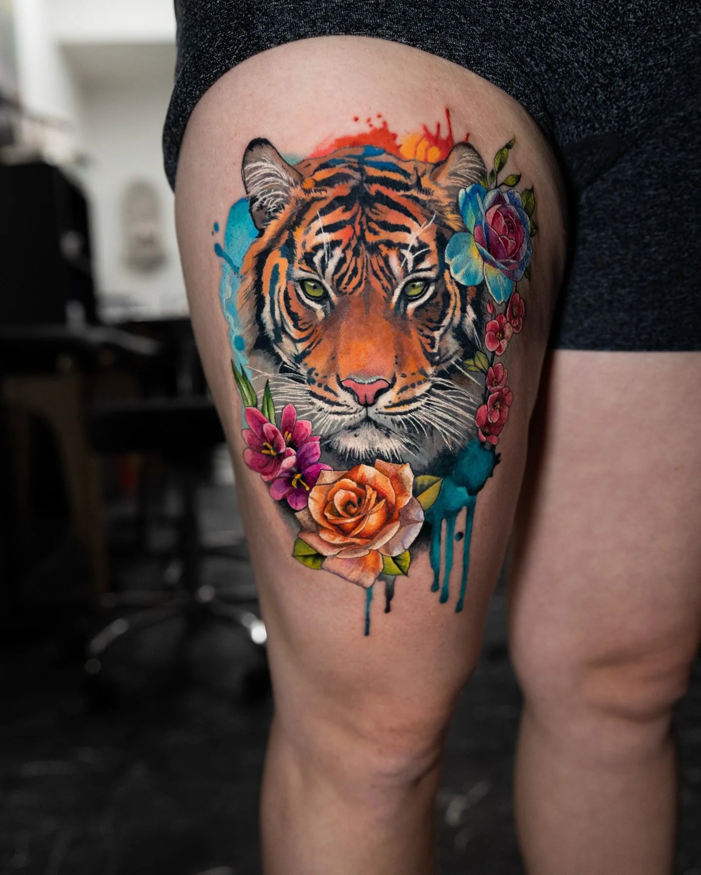color realism tiger tattoo on woman thigh