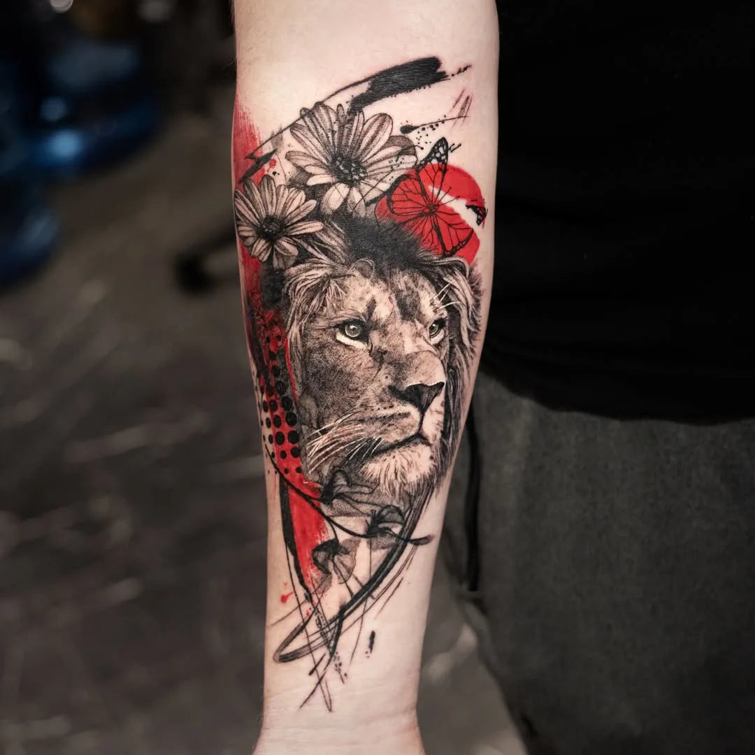 trash polka lion tattoo on forearm