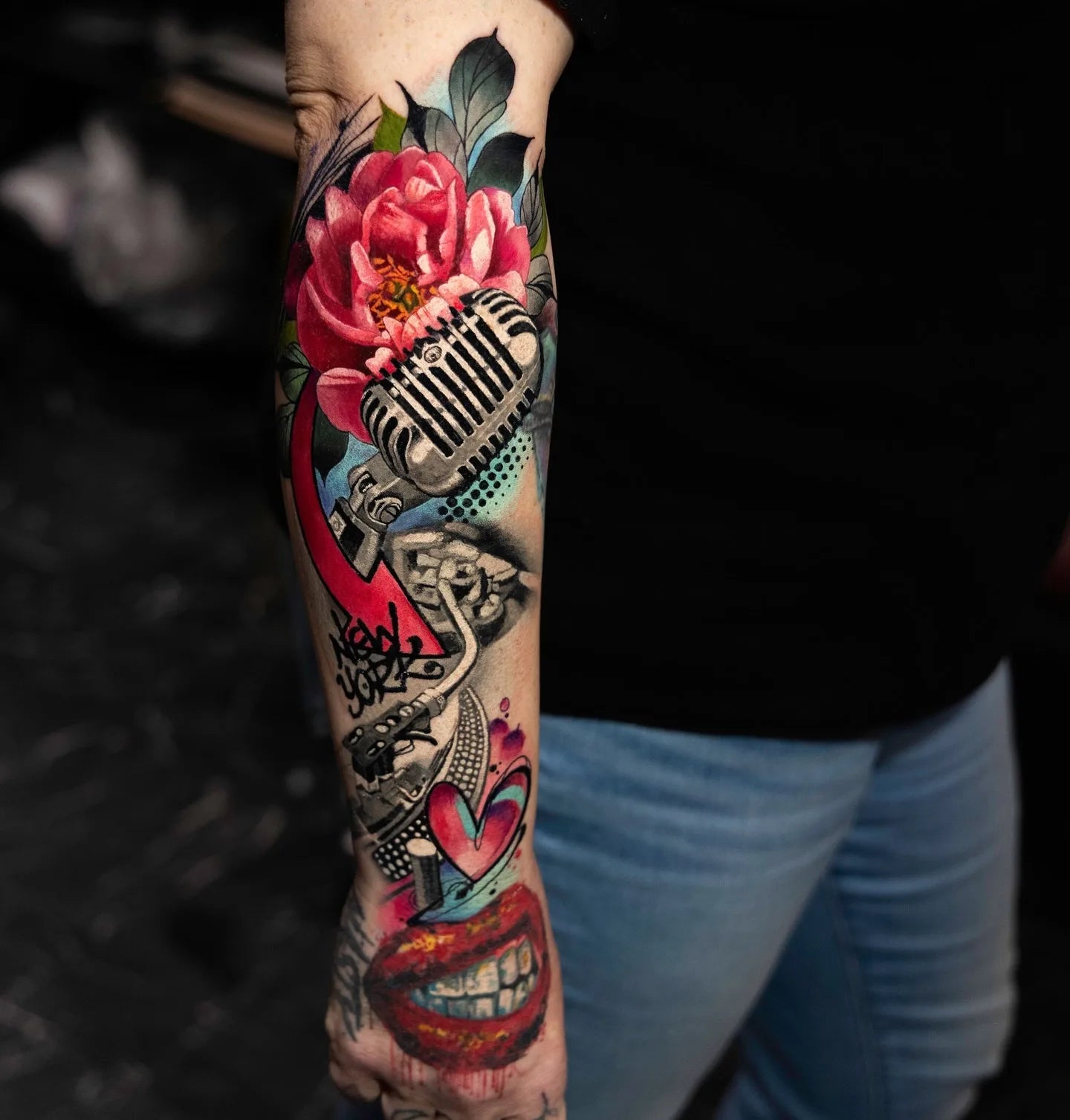 abstract trash polka color realism forearm sleeve tattoo