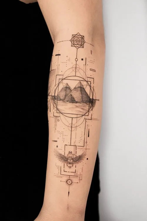 geometric mountain forearm tattoo