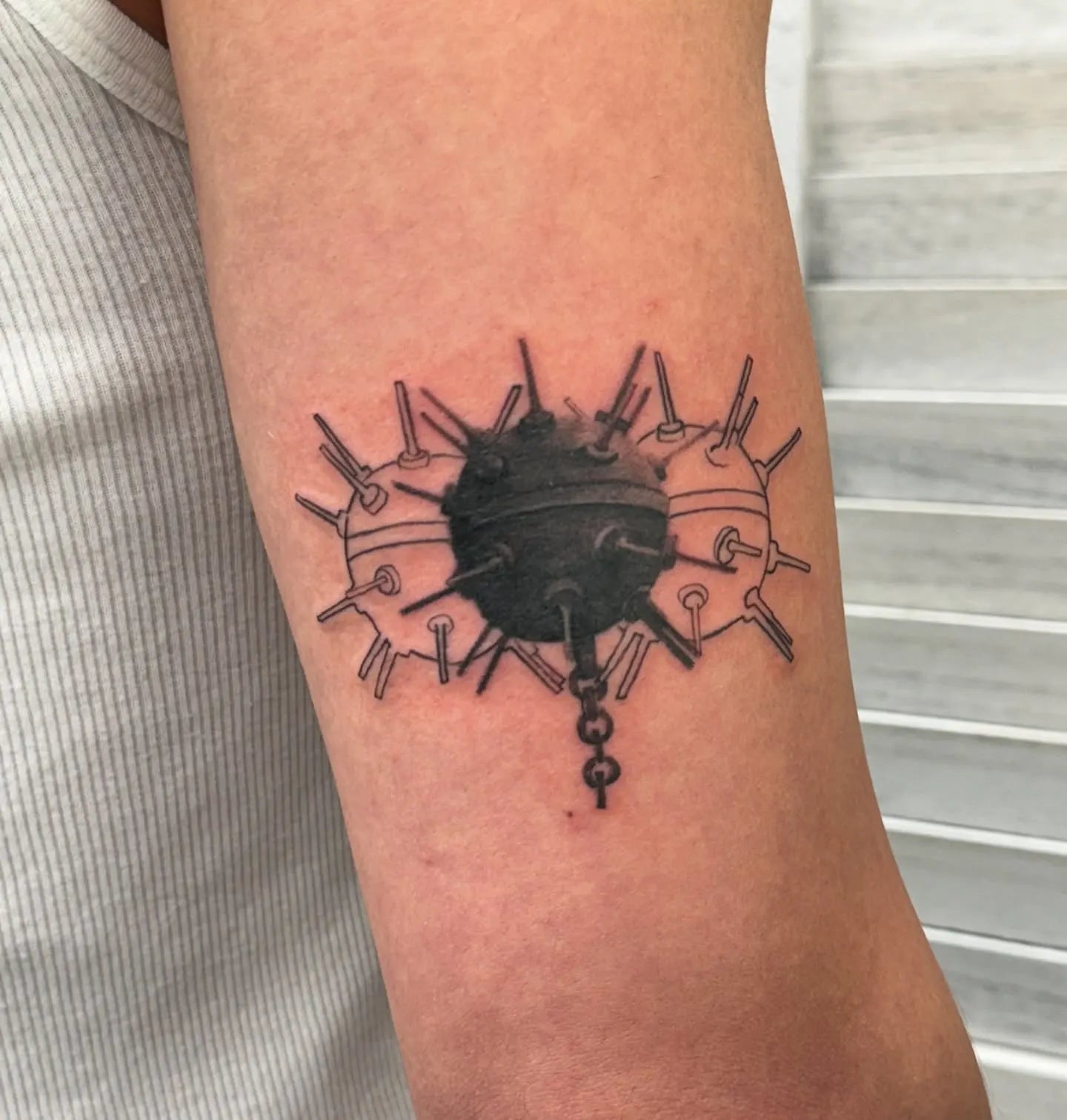 realistic meteor hammers outline tattoo on upper arm