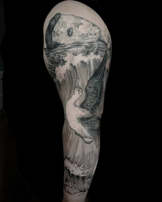 black and grey abstract waterfall crane tattoo on full arm