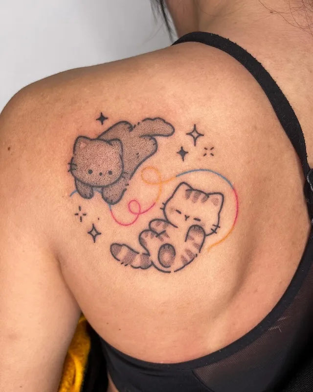 cute hand poke minimalist cats tattoo on woman back