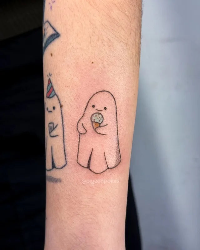 cute ghost eating ice-cream hand poke minimalist tattoo