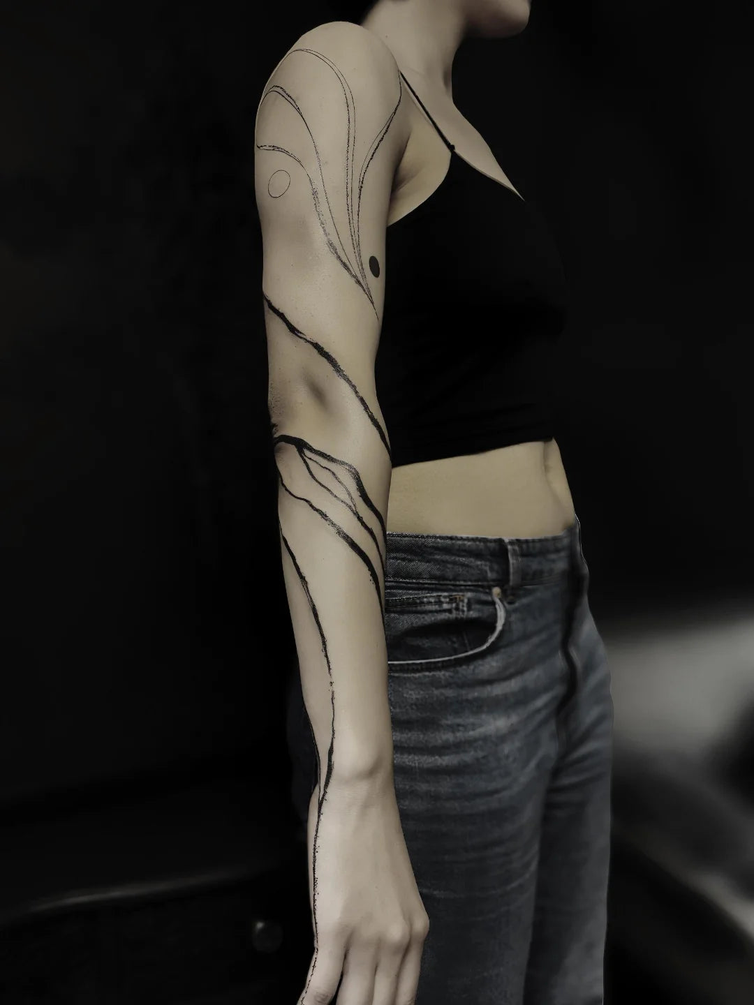 blackwork abstract lines on woman arm