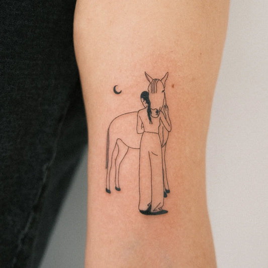 woman and horse fine line tattoo