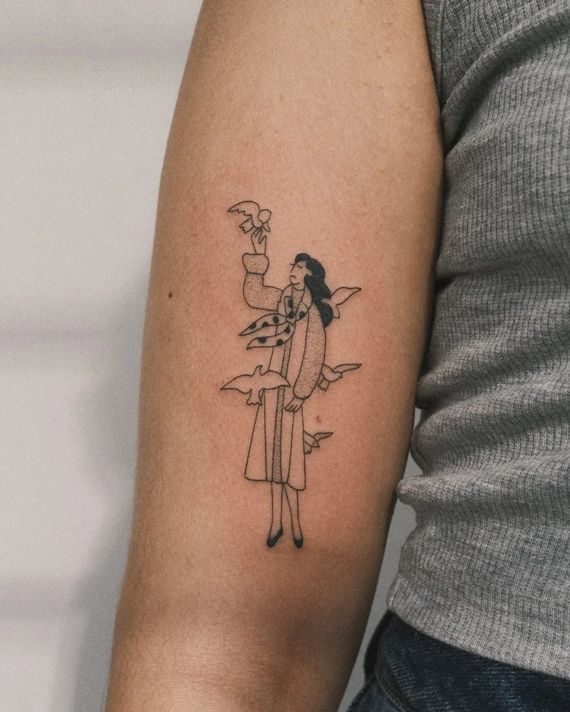 abstract woman fine line tattoo on upper arm