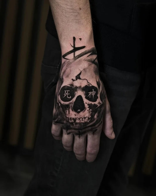black and grey skull hand tattoo with chinese characters 死神
