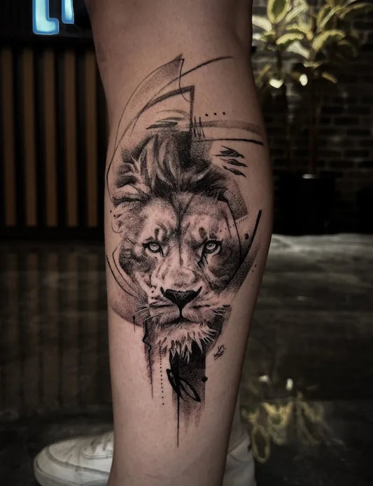 black and grey abstract dotwork lion tattoo on leg