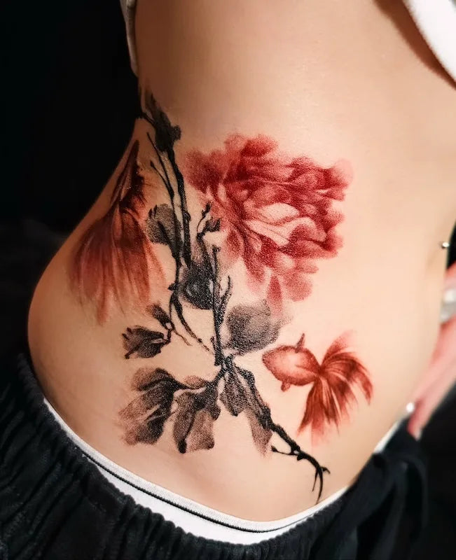 oriental color floral tattoo on woman waist