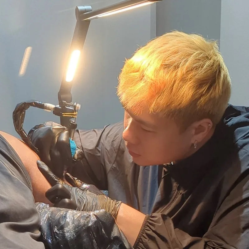 Singapore tattoo artist Junheng