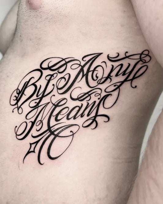 By Any Means chicano font blackwork lettering tattoo on man rib