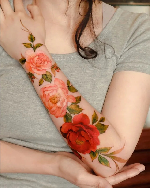 colorful realistic flower tattoo forearm half sleeve
