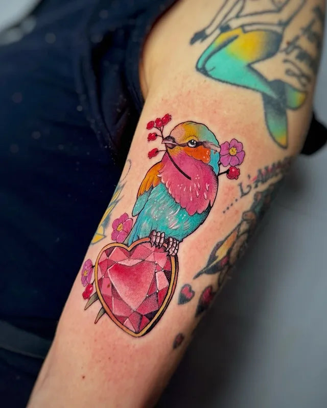 colorful bird with flowers and heart gen tattoo