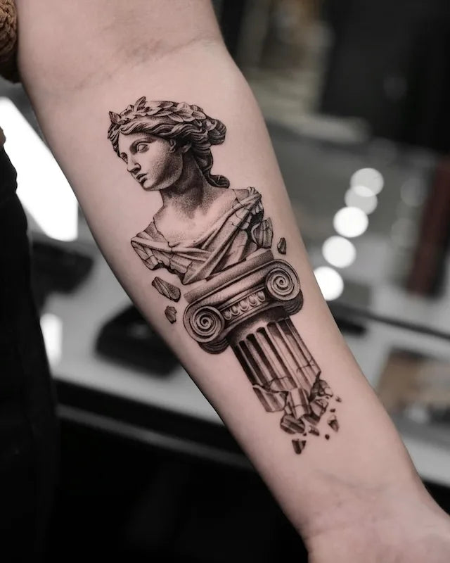 greek statue sculpture black and grey realism tattoo on forearm