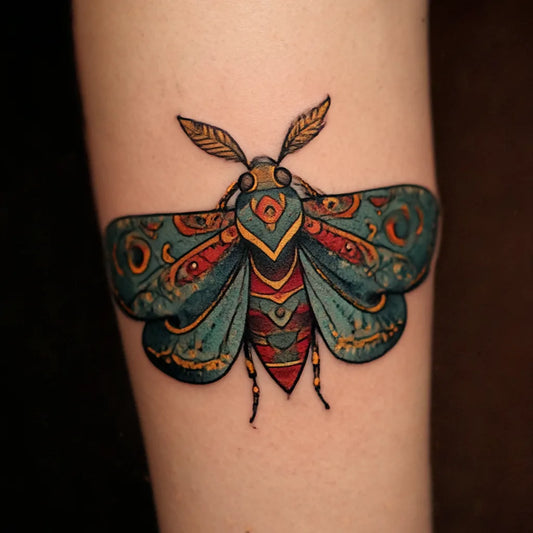 neo-traditional moth tattoo idea design