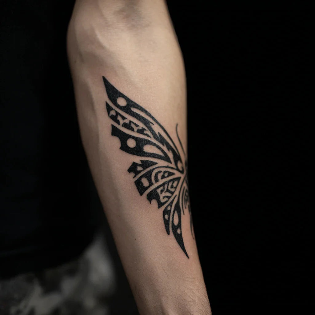 tribal moth wing tattoo idea design