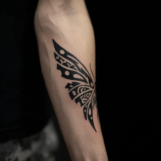tribal moth wing tattoo idea design